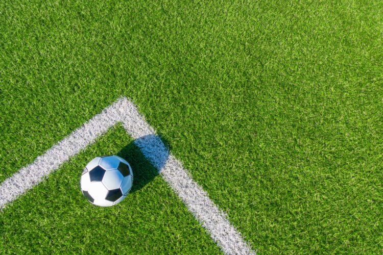Football on a pitch